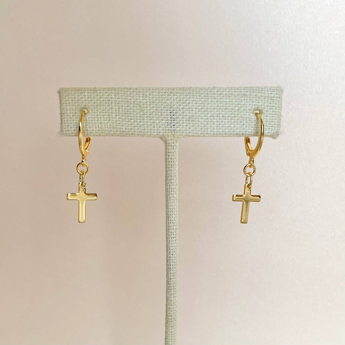 CROSS HUGGIE HOOPS | 14k yellow gold | cross charm earrings