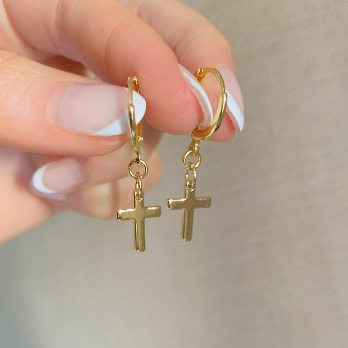 CROSS HUGGIE HOOPS | 14k yellow gold | cross charm earrings