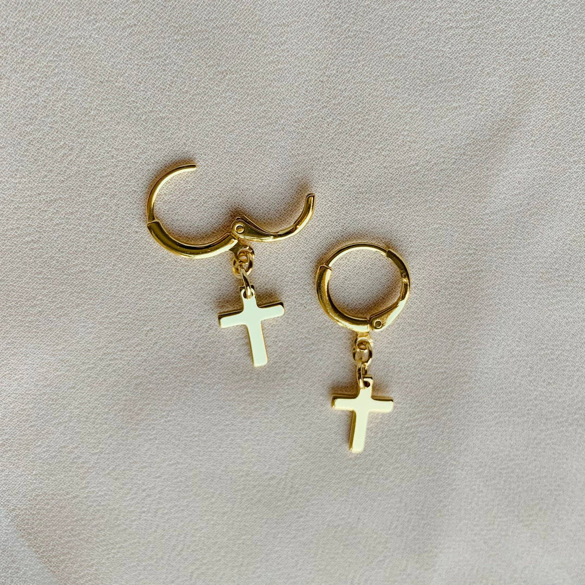 CROSS HUGGIE HOOPS | 14k yellow gold | cross charm earrings